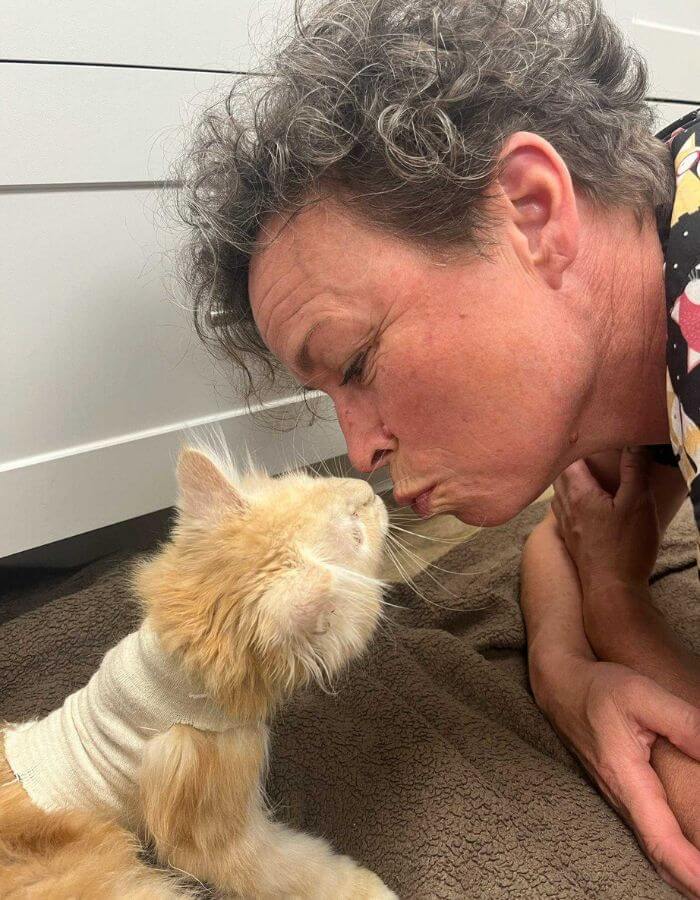 West Niagara Animal Hospital staff kissing a cat named Roger West Niagara Animal Hospital staff kissing a cat named Roger